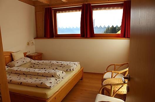 Slaapkamer van vakantiewoning Heidi