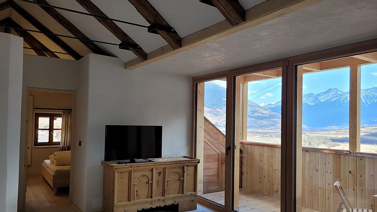 Woonkamer met balkon en panorama
