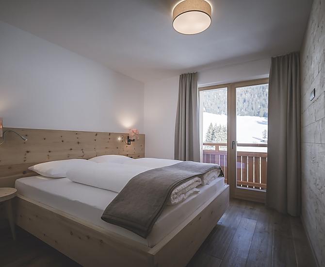 Doppelbettschlafzimmer mit Balkon