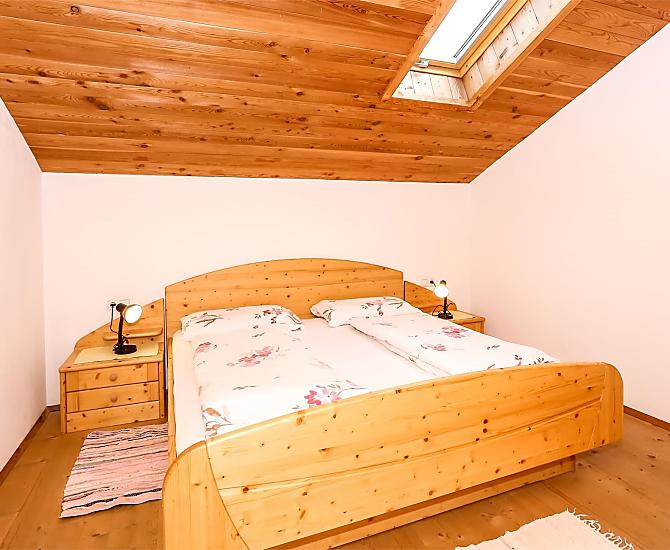Slaapkamer van vakantiewoning Kassian